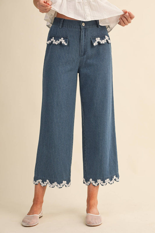 denim jeans with scalloped floral pockets