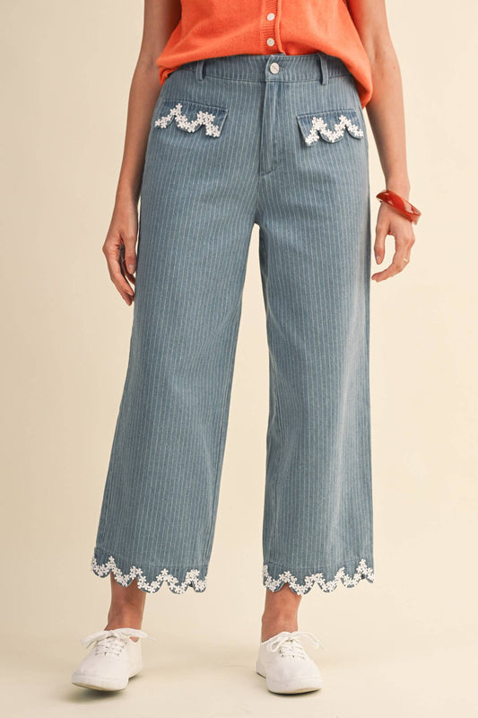 denim jeans with scalloped floral pockets