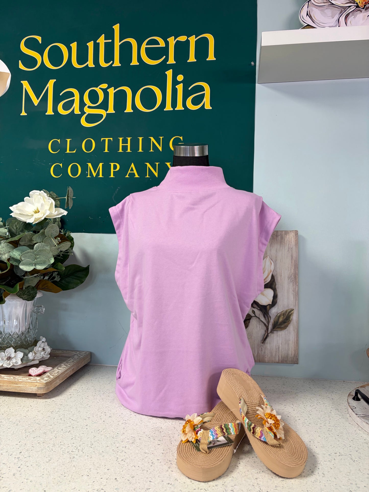 purple sleeveless mockneck