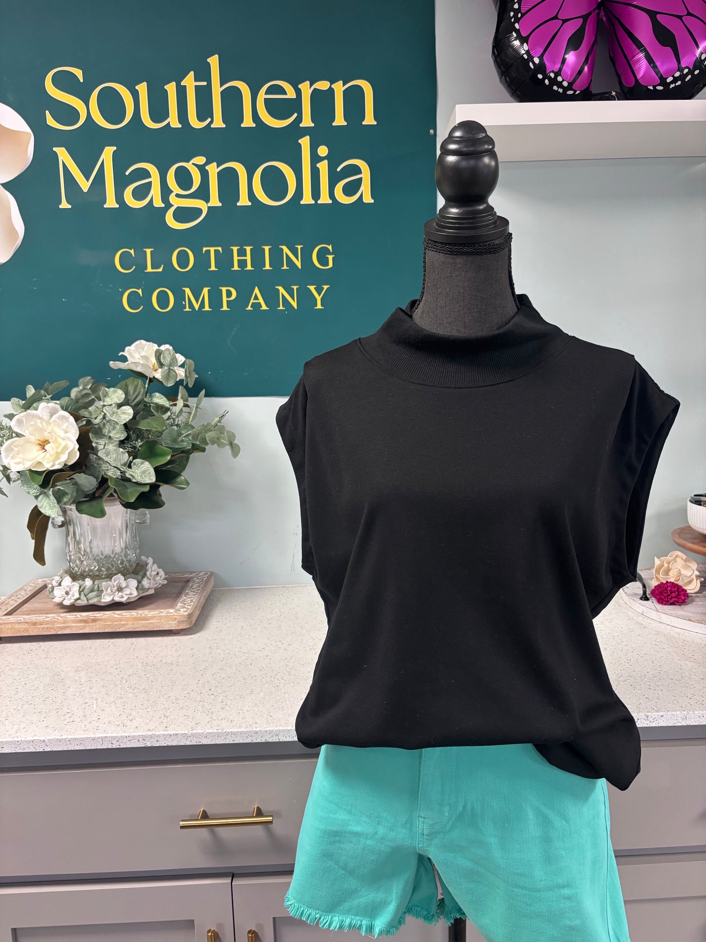 Black Sleeveless Mockneck